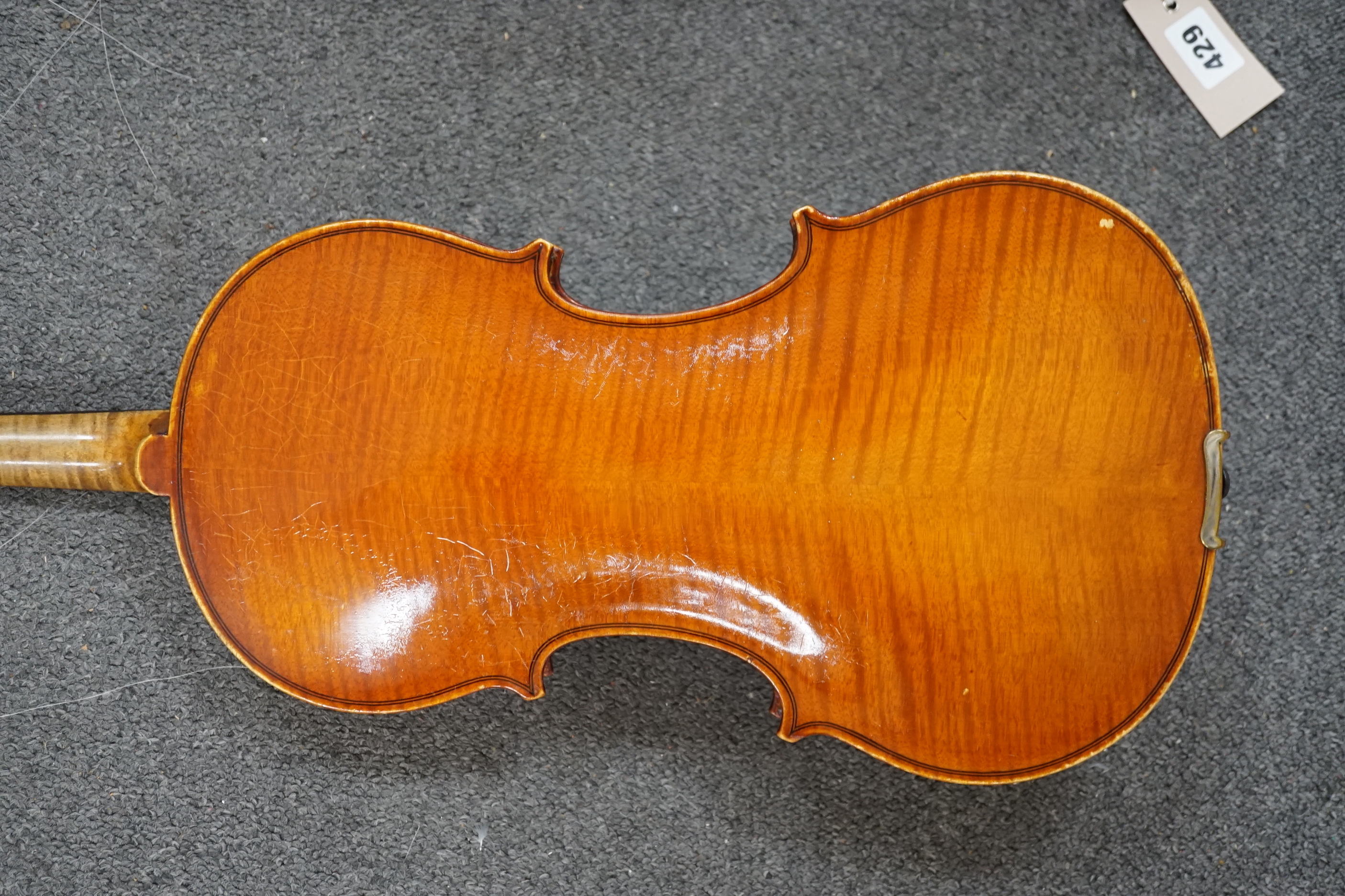 A 19th century violin with silver mounted bow and case, back measures 36cm CITES Submission reference JX7RJU7S